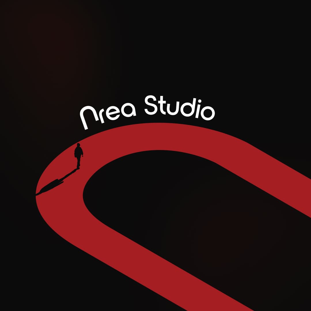 Silhouette marchant sur un chemin rouge courbé sous le logo blanc Nrea Studio.